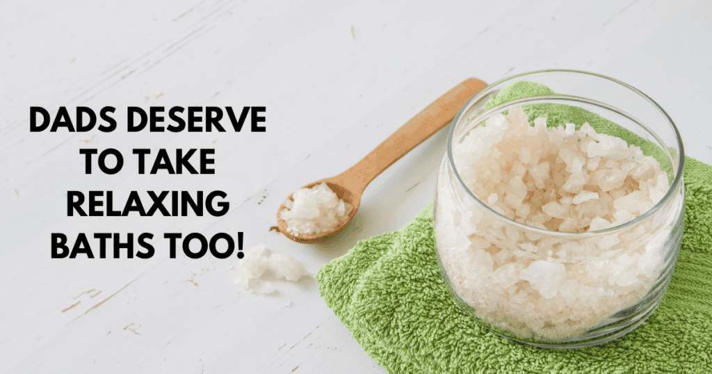 Dads deserve to take relaxing baths too! Picture of wash cloth, glass jar of bath salts next to a wooden spoon filled with salts. 